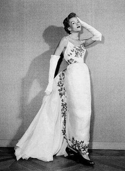 1953 Model in beautiful embroidered organdy evening gown with floating back panel, by Givenchy