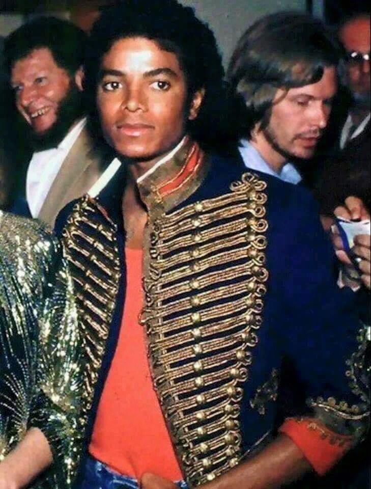 Off The Wall Era: Red Shirt, Miltiary style blue jacket with gold and red